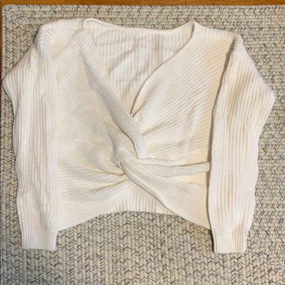White Roxy sweater with low back